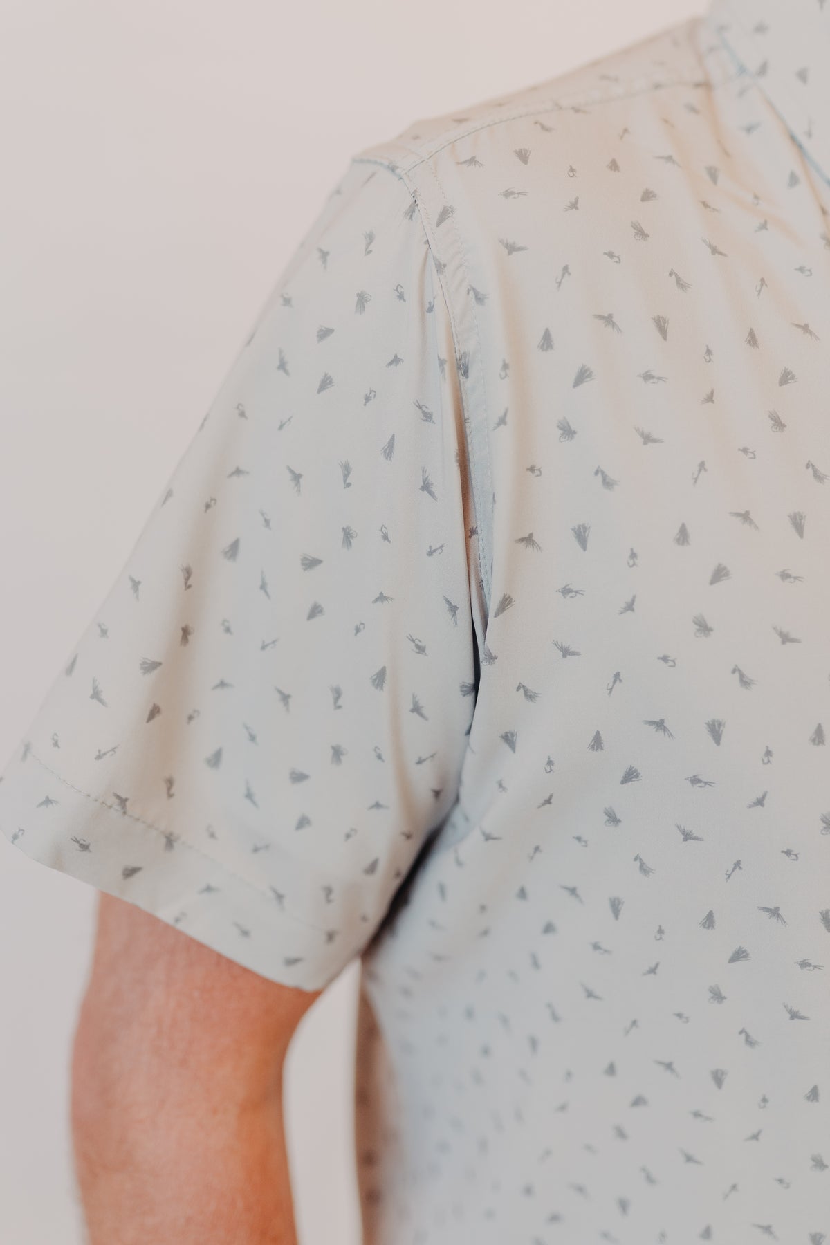 Dkota Grizzly | Reel Scattered Fly Print Top | Pebble Drift