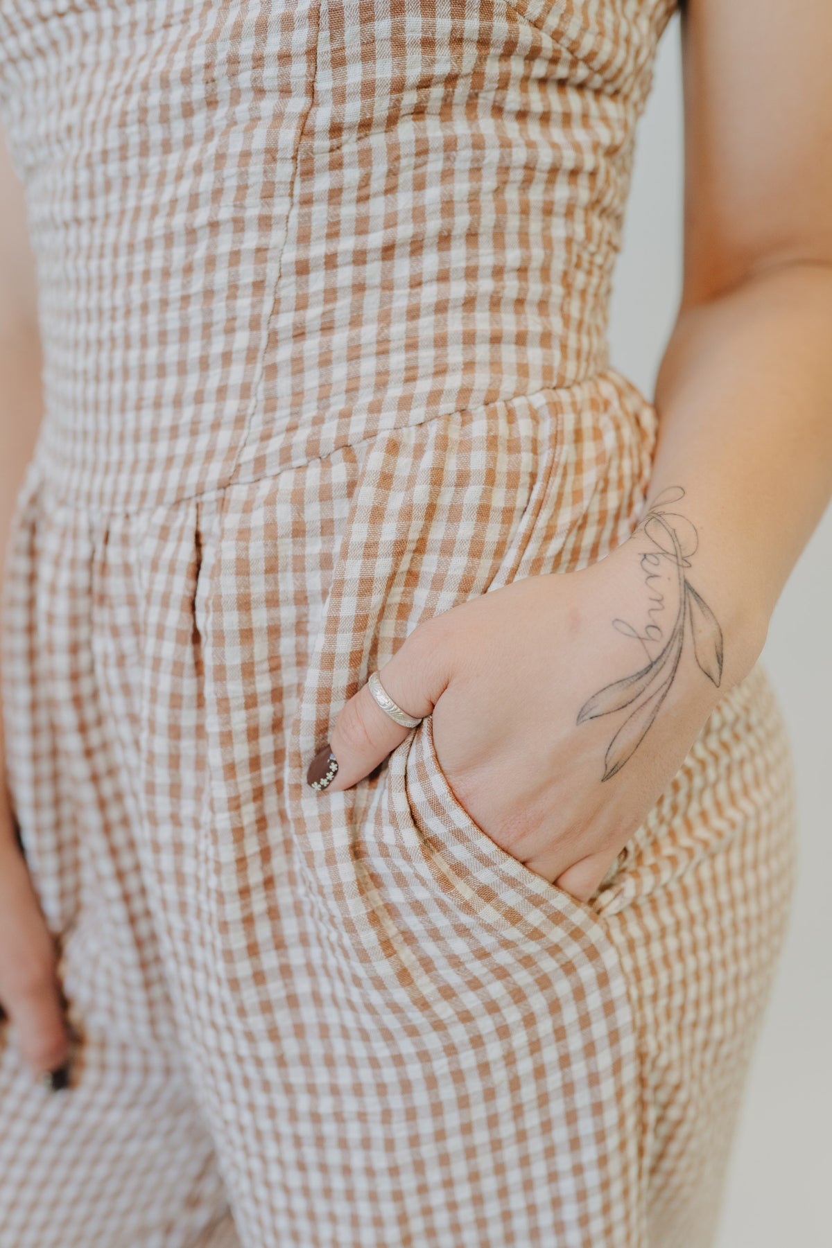 Miou Muse | Gingham Tie In Back Jumpsuit | Brown