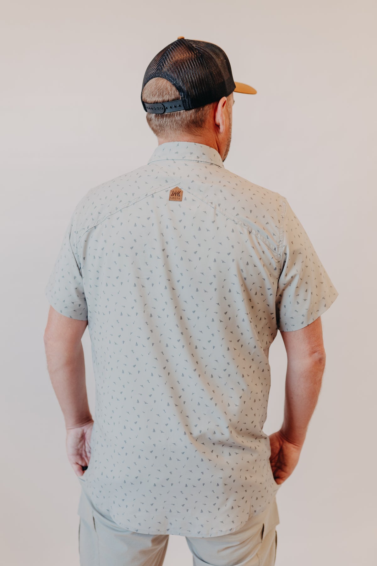 Dkota Grizzly | Reel Scattered Fly Print Top | Pebble Drift